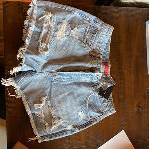 Distressed cut off jean shorts